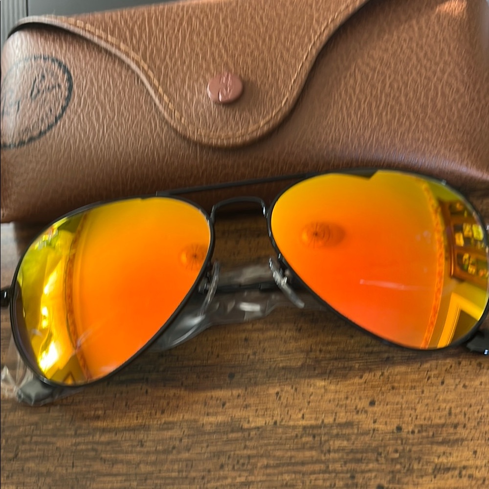 Ray-Ban Aviators with Vibrant Orange Lenses and a Black Frame. Brand New.